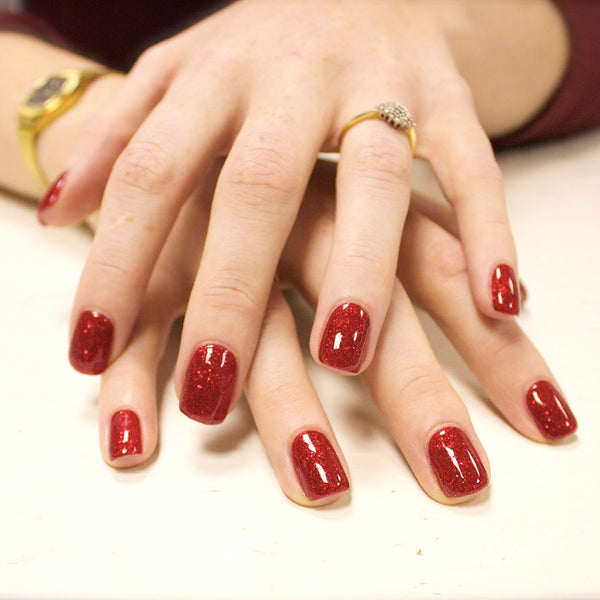 Red glitter gel nails