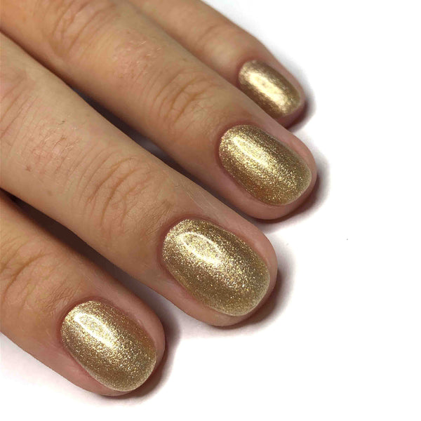 Soft gold glitter gel nails