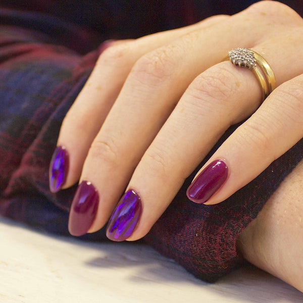 Deep violet gel manicure