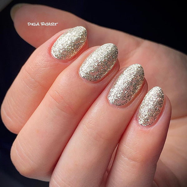 Gold glitter gel nails