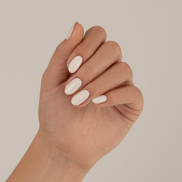 Creamy ivory nail gel on nails