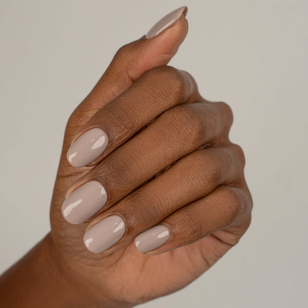 Muted taupe nail gel on nails