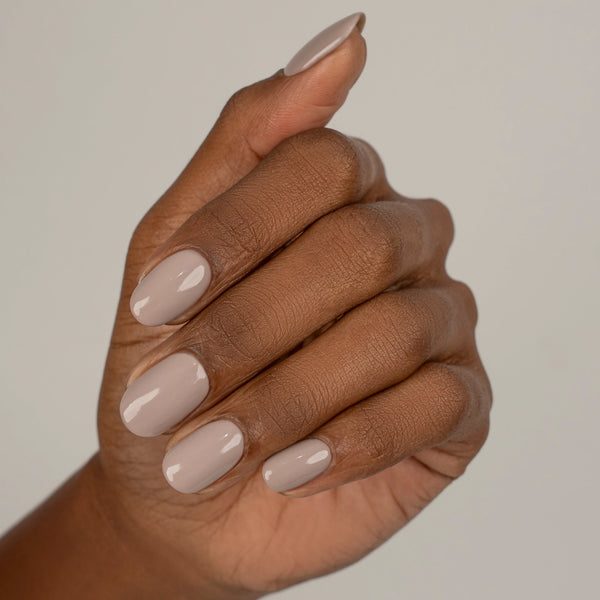 Muted taupe nail gel on nails