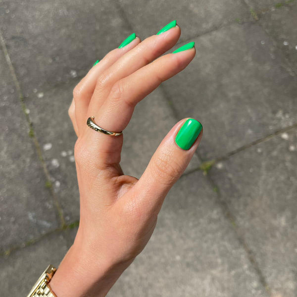 Bright emerald green nails