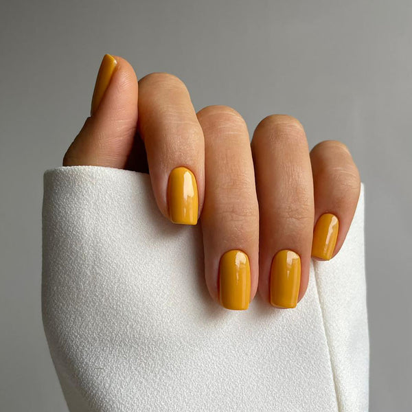 Golden yellow gel nails