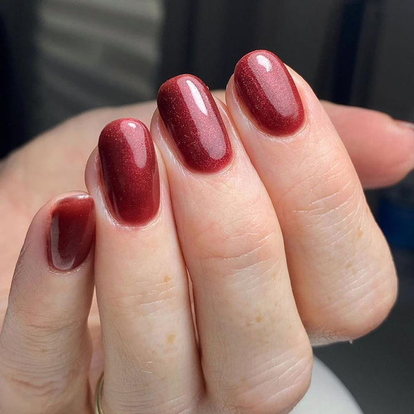 Dark red shimmer nail gel 