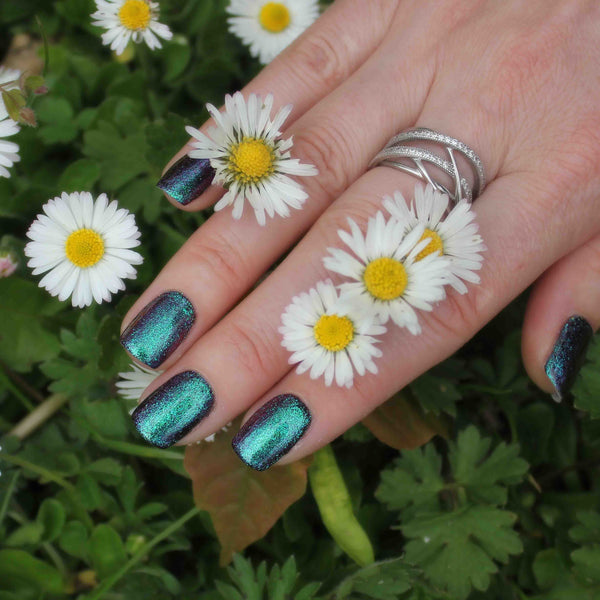 Metallic green nails