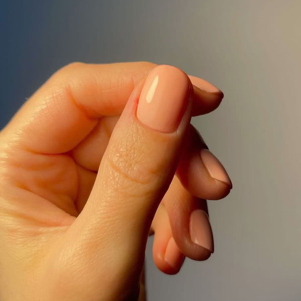 Bright peach nails