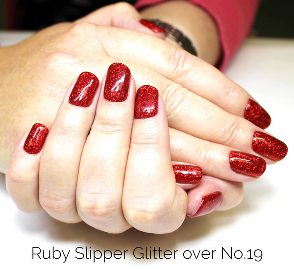 Red nail glitter gel manicure