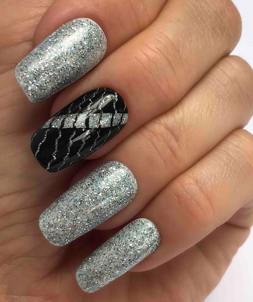 Silver and blue glitter gel manicure
